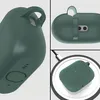 A collage of images showing a dark green silicone case for AirPods Pro 3, including a close-up of the loop, a view of the charging port, and the case on a wireless charger. Produktbild-Vorschau