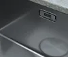 Close-up view of a stainless steel sink with a brand logo. Podgląd zdjęcia produktu