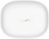 A white Xiaomi charging case for earbuds is shown from a top-down perspective on a white background. Náhľad obrázku produktu