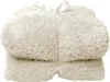 A fluffy white blanket folded and tied with a white ribbon. Náhľad obrázku produktu