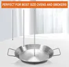 A stainless steel vertical rotisserie set with three skewers is displayed on a table. Produktbild-Vorschau
