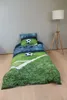 A soccer-themed duvet cover and pillow set displayed on a bed. Náhľad obrázku produktu