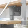 Close-up view of a spiral staircase's wooden step and metal support structure. Produktbild-Vorschau