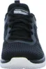 A close-up front view of a black Skechers training shoe with white soles. Anteprima dell’immagine prodotto
