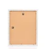 The back of a white vintage-style picture frame is shown against a white background. Produktbild-Vorschau
