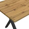 A close-up view of a wooden table with black metal legs. Náhľad obrázku produktu