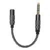 A close-up studio shot of an audio adapter cable against a white background. Podgląd zdjęcia produktu