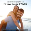 A couple is smiling and enjoying themselves on a beach. Produktbild-Vorschau