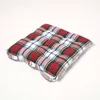 A square seat cushion with a plaid pattern. Náhled obrázku produktu