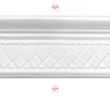 A close-up, straight-on view of a white decorative molding strip. Anteprima dell’immagine prodotto