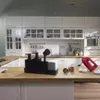 A kitchen counter with various items including a soap dispenser set, a hand mixer, and eggs. Produktbild-Vorschau