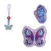 A collection of butterfly-themed accessories, including a beaded charm and two embroidered patches, displayed against a white background. Anteprima dell’immagine prodotto