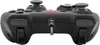 A black gamepad with a red light is shown against a white background. Náhľad obrázku produktu