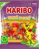 A bag of Haribo Hoppi Karotti gummy candies, featuring cartoon characters and product information. Produktbild-Vorschau