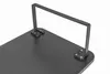 A close-up view of a black monitor stand attachment on a black surface. Náhled obrázku produktu
