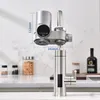 A water filter attached to a faucet in a kitchen setting. Produktbild-Vorschau