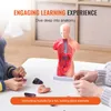 Children assembling a human torso anatomy model on a table. Podgląd zdjęcia produktu