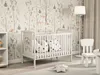 A nursery room with a crib, chair, and bookshelf, decorated with woodland-themed wallpaper. Náhľad obrázku produktu