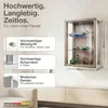 A wall-mounted glass display cabinet filled with various items, with descriptive text and feature callouts on the left. Produktbild-Vorschau