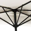 Close-up view of the internal structure of a cream-colored umbrella with a black metal frame. Anteprima dell’immagine prodotto