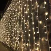A wall decorated with strings of white LED lights. Náhled obrázku produktu