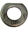 A close-up of a metal washer with the word "UP" and arrows indicating direction. Produktbild-Vorschau