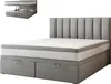 A bed with a mattress and headboard, shown on a white background. An inset shows the storage compartments of the bed base. Voir les images du produit