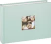 A mint green photo album with a cutout window on the cover displaying a photo of three smiling young women. Produktbild-Vorschau