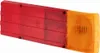 A red and orange automotive tail light assembly is shown against a white background. Produktbild-Vorschau