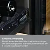 Close-up of a black refrigerator filter with control buttons and a bottle inside the refrigerator. Voir les images du produit