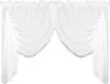 A white sheer curtain with decorative trim. Náhled obrázku produktu