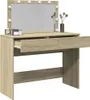A vanity table with a mirror and lights, set against a white background. Náhľad obrázku produktu
