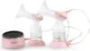 A pink double electric breast pump with two bottles and a control unit. Podgląd zdjęcia produktu