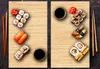 Two wooden boards with sushi and accompaniments. Náhled obrázku produktu