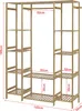 A wooden garment rack with multiple shelves and a hanging rod, shown against a white background with dimensions indicated by red lines and text. Anteprima dell’immagine prodotto