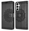 A black leather phone case with a mandala design, shown in two configurations: closed and open. Produktbild-Vorschau