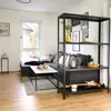 A living room with a sectional sofa, coffee table, and a metal shelving unit. Produktbild-Vorschau