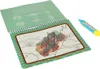 An open water coloring book with a marker, showing an underwater scene with a lobster. Podgląd zdjęcia produktu