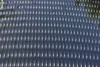 A close-up, angled view of a black corrugated tube, likely a solar collector hose, with light reflecting off its ridges. Podgląd zdjęcia produktu