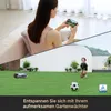 A split image showing a woman relaxing on a couch using her phone, and a child playing in a garden with a robotic lawnmower and a soccer ball. Produktbild-Vorschau