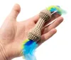 Katzenspielzeug aus Pappe · Kratzpappe mit Federn · ca. 10 Produktbild-Vorschau 4