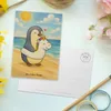 Mr. & Mrs. Panda Postkarte Pinguin Schwimmring Design - Produktbild-Vorschau 3