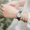 A close-up shot of a person's wrist wearing a silver and black Casio watch and bracelets. Anteprima dell’immagine prodotto