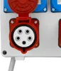 A close-up view of an industrial electrical outlet with a red protective cover. Produktbild-Vorschau