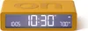 A yellow digital alarm clock with a blue display showing the time and alarm settings. Podgląd zdjęcia produktu