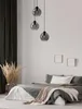 A bedroom scene with a bed, curtains, and a pendant light. Anteprima dell’immagine prodotto