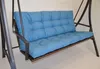 A close-up shot of a blue cushion on a garden swing. Produktbild-Vorschau
