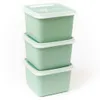 Three stacked green food storage containers with white lids, against a white background. Náhľad obrázku produktu