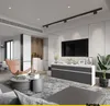 A modern living room with a TV console, armchair, and coffee table. Produktbild-Vorschau