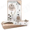 The image shows the packaging and contents of a wooden mechanical model kit, specifically a pendulum clock. Voir les images du produit